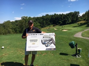 Chris Freeman '83 - attached is a picture of him holding his prize