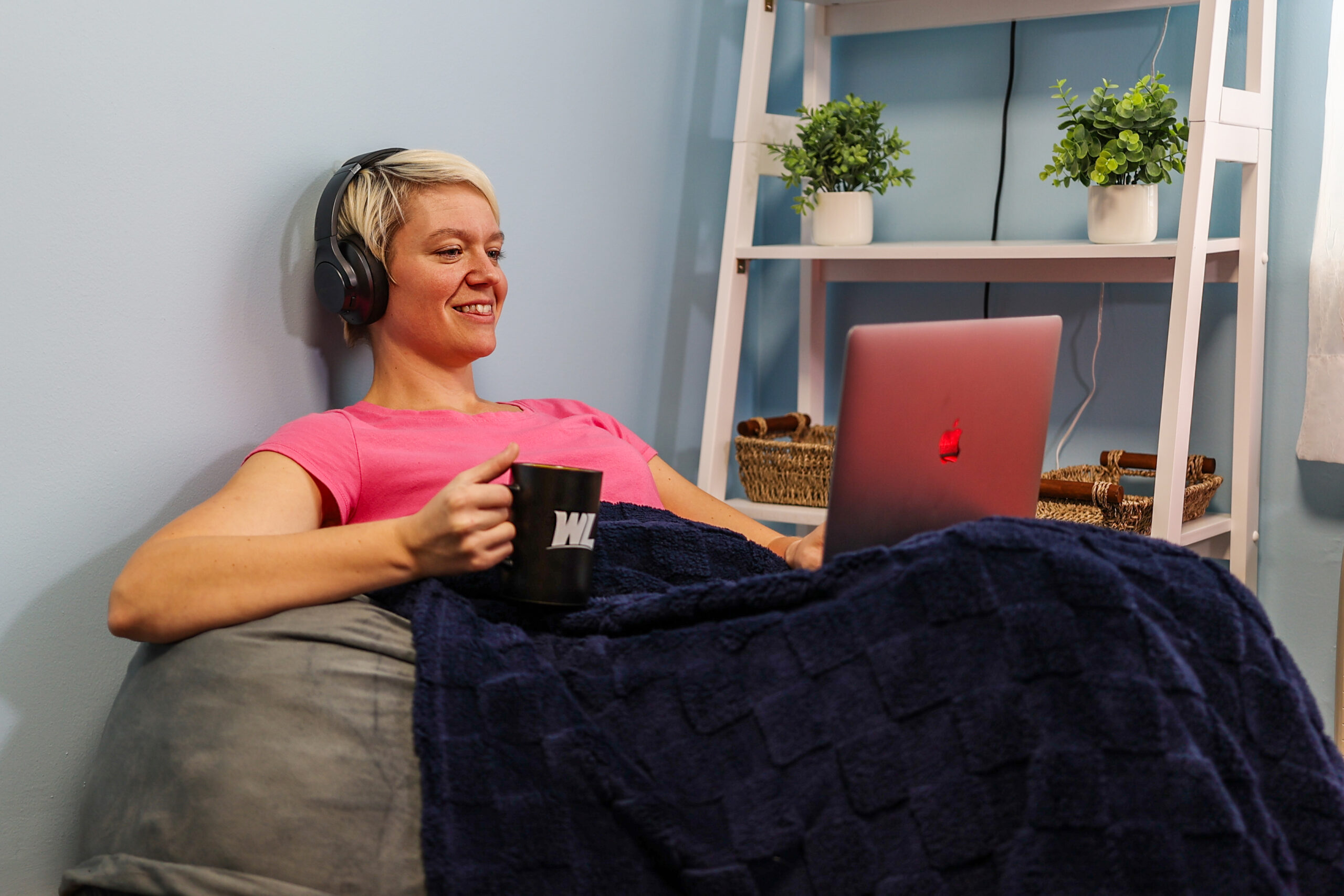 Female student learning from home in cosy room