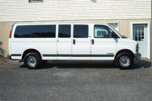Side view of white passenger van