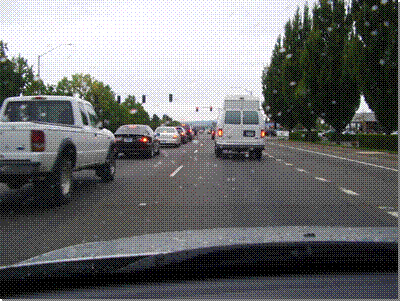 View of driving behind van