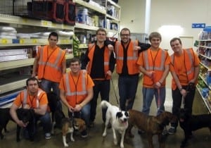 From left, Tannon Mossor, Jeshua Irazabel, Bryan Gasaway, Evan Newman, Kyle Cook, Kyle Lutz and Jeffrey Tice help out atthe Hancock County Animal Shelter. 