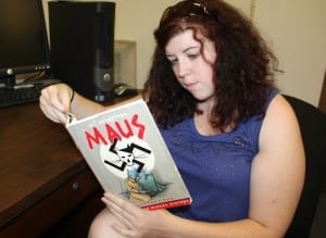 Junior Emily Hastings reads Maus, a classic in the realm of graphic narrative literature