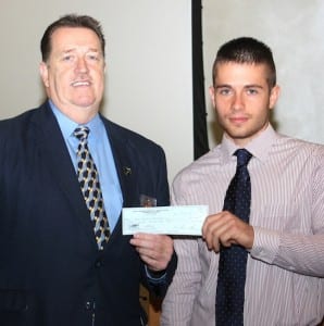 Ohio County Sheriff Pat Butler presents scholarship to WLU Criminal Justice Senior Justin Byers.