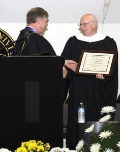 Marc Harshman receives honorary degree from President Capehart.