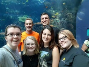Rebecca Smith, Sarah Jones, Catherine Tate and Ashley Cole, back, Hayden Blazer and Hunter Craft visit the Georgia Aquarium.