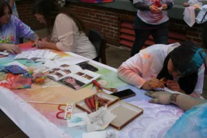 Students getting henna tatoos