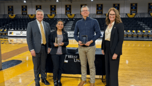 Pictured from left; Dr. Tim Borchers, President; Dr. Vishakha Maskey, Excellence in Teaching; Mr. Michael Aulick, Excellence in Service; Dr. Cathy Monteroso, Interim Provost and Vice President for Academic Affairs. Not pictured: Dr. Chelsea Robertson, Excellence in Professional Activity.