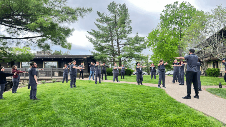 The Oglebay Park Resort Housekeeping department employees take 10-15 minutes each day performing pre-shift group stretches and exercises as a result of an educational seminar presented by the West Liberty University Master of Exercise Physiology students.