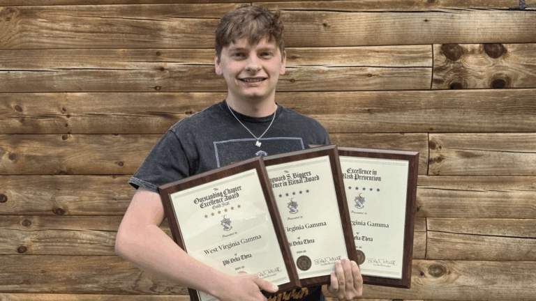 WLU student Chance Maffe with awards received at this summer’s national Phi Delta Theta conference_ cover
