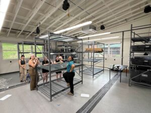 Associate Curator Tanya Khan has overseen the construction of both the turtle and crayfish propagation labs at the AACC. Here she is with several students who spent the summer assisting with the AACC's husbandry spaces construction.