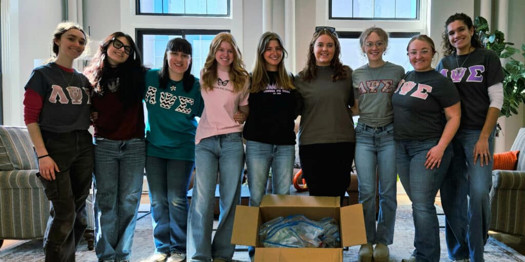 West Liberty Universitys Lambda Psi Sigma Volunteers at Wheeling YWCA