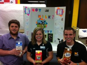 West Liberty University education students present information on the benefits of milk at a health fair at West Liberty Elementary School.