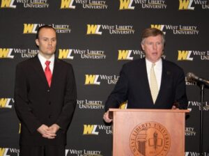 President Robin C. Capehart introduces Dr. Serkan Catma to media.