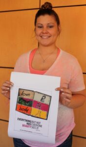 Christina Boyd is shown with her NOW design.