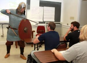 Dr. Darrin Cox makes a point in history class.