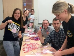 PA students gather to create 100 bags for cancer patients, clockwise from left, Annisce Ramanna, Katie Moio, Elizabeth Denniston, Ross Keffer, Jonathan Finkel and Hannah Crewdson.
