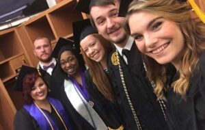 From left, XXX, Michael Hensley, Christian Rice, Mary Ward, Ramsay Core and Teracyn Rich gather at Commencement.
