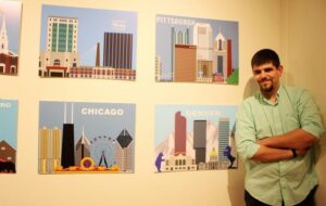 Cory Voll stands near his work.
