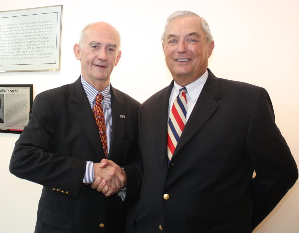 Dr. Phil Stahl, Rich Glover shake hands