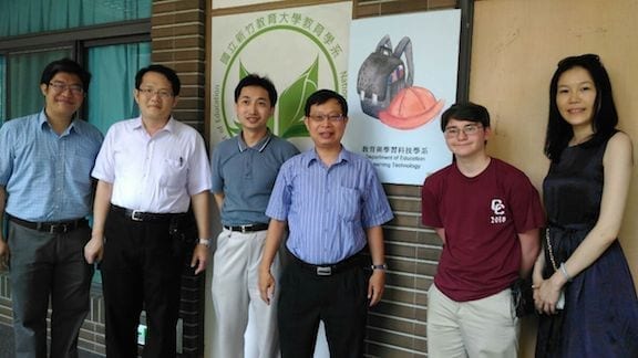 Sam Marshall and Dr. Peng are at the far right of the photo.