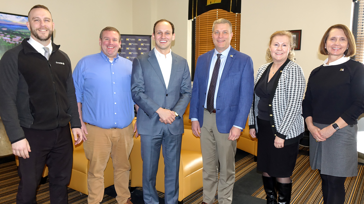 WLU faculty and administration with James Mull